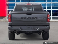 This Ram 1500 has a dependable Gas/Electric V-6 3.6 L/220 engine powering this Automatic transmissio... (image 6)