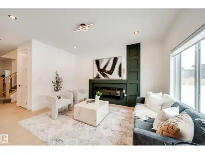 This professionally curated BRAND NEW half duplex greets you w/ a GRAND open-to-above entrance & a l...