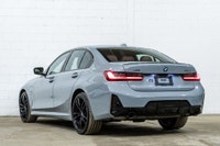 *English below* *Français:* Cette spectaculaire BMW 330e xDrive 2023 affichant 48 882 km, provenant... (image 5)