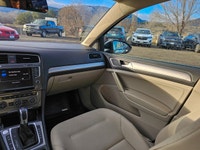 Experience the eco-friendly power of the 2016 Volkswagen e-Golf SEL Premium in attractive white. Thi... (image 8)