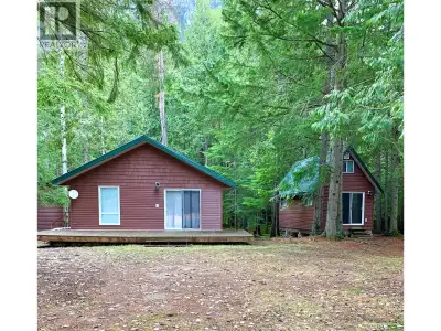 LAKEFRONT PARADISE on the Arrow Lakes. 2.06 acres , Beautiful private setting fully treed in East Ar...