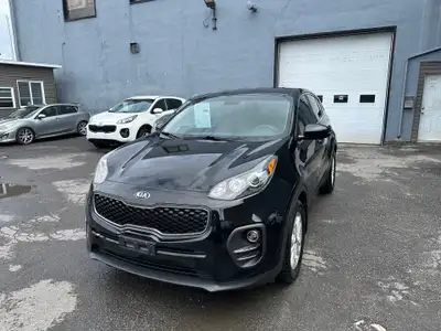 2018 Kia Sportage Engine: Moteur à 4 cylindres 2.4L L/100Km City: 10.3 L/100Km Hwy: 7.8 Safety Equip...