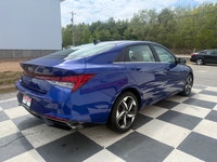 A stylish compact sedan with a modern interior, advanced technology, and efficient performance, offe... (image 3)