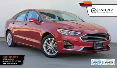 This 2020 Ford Fusion SEL Plug in Hybrid with 73,783 km. is equipped with fuel economy 2 L Hybrid Pl...