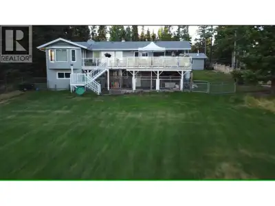 Stunning Lakeshore Home on Tchesinkut Lake. Escape to your own slice of paradise with this beautiful...