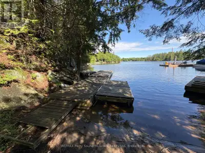 Waterfront building lot with 600 feet of shoreline and 2.2 acres. Enjoy the gentle entry sand beach...