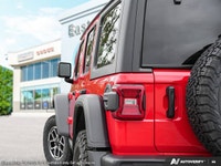 This Jeep Wrangler has a dependable Intercooled Turbo Premium Unleaded I-4 2.0 L/122 engine powering... (image 9)