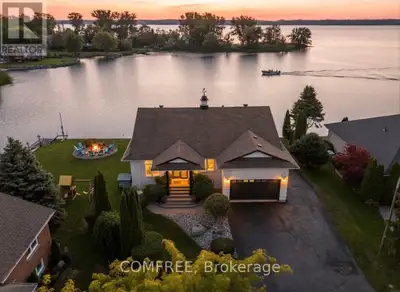Welcome to your lakeside escape, a stunning southern-exposure waterfront home at the end of a quiet...