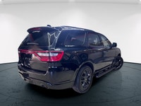 Step into the sophisticated allure of the 2024 Dodge Durango R/T Plus AWD, a striking SUV clad in a... (image 1)