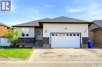 Welcome to 4113 Green Willow Terrace E—an impressive raised bungalow in the highly sought-after Gree...