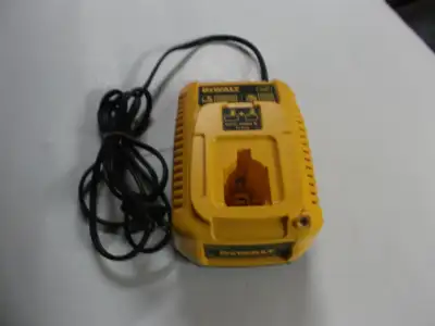 NEW- DEWALT CHARGER FOR 7.2-18V BATTERIES MODEL DC 9310-- NEVER USED. i am in belleville complete 41...