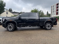 This GMC Sierra 2500 Denali 4WD Crew boasts a Turbocharged Diesel V8 6.6L/ engine powering this Unkn... (image 1)