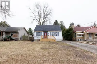 Set on an exceptional 250 ft deep lot, this beautifully renovated 1 1/2 storey, 4 bedroom home offer...