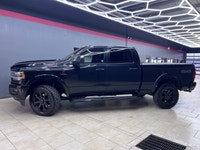 The 2019 Ram 2500 Laramie, with its bold black exterior and sophisticated 4x4 drive, promises except... (image 3)