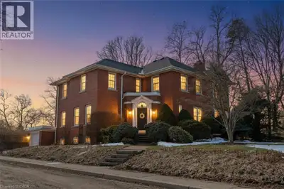 Set on a beautifully landscaped corner lot along one of Simcoe’s most established streets, this stat...