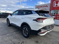 Awarded an IIHS Top Safety Pick, the 2023 Kia Sportage LX in striking Snow White Pearl ensures peace... (image 6)