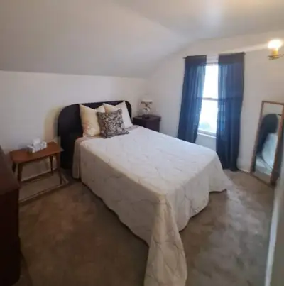 Private room ,- bright, second floor room in house, sharing kitchen and 1.5 bathrooms. Includes util...