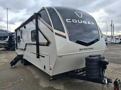 Keystone Cougar Half-Ton travel trailer 25MLEWE highlights: Rear Kitchen Spacious Full Bath King Bed...
