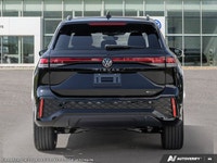 This Volkswagen Tiguan has a trusty Intercooled Turbo Regular Unleaded I-4 2.0 L/121 engine powering... (image 6)