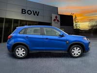 Meet the 2026 Mitsubishi RVR ES, a blue-front-wheel drive SUV that delivers confident handling and a... (image 3)