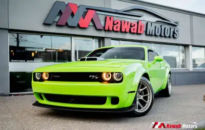 The special-edition 2023 Dodge Challenger R/T Scat Pack Swinger represent the third and fourth of se...