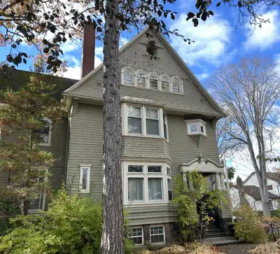 Charming flat on top floor of gracious older home situated on beautiful tree lined boulevard in the...