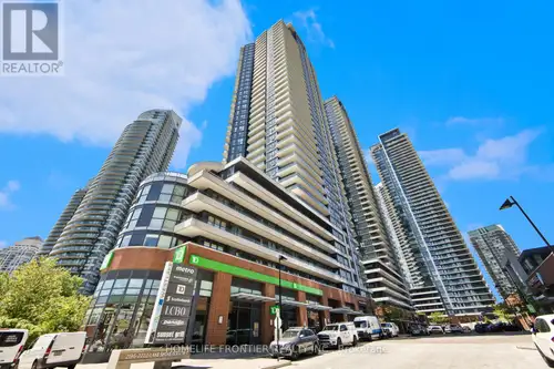 Unbeatable Panoramic Lake Views Await! This sun-filled 2BR+Den corner suite boasts 9ftceilings, floo...