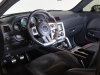 This aggressive 2014 Dodge Challenger SRT8 delivers iconic muscle car performance with unmistakable... (image 8)