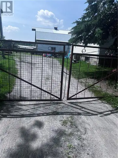 Welcome to Country Living on this 158-acre farm featuring a 2 bedroom home, a large bright hunting c...