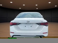 The 2023 Nissan Sentra SV CVT in pristine White is a front-wheel-drive sedan that handles beautifull... (image 5)