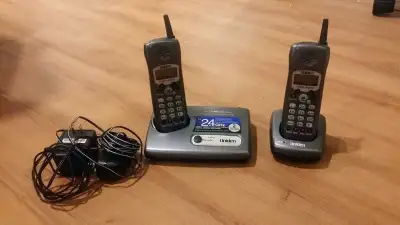 Uniden: Rechargeable 2 Phone System Includes Phone and Base and One extra Phone... Works perfectly a...