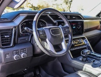 The 2023 GMC Sierra 1500 Denali Crew Cab Short Box 4-Wheel Drive is a powerhouse of capability wrapp... (image 6)