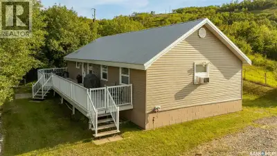 Escape to lake life with this spacious 4-bedroom, 2-bathroom cabin nestled in the desirable Parkview...