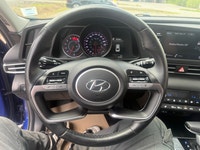 A stylish compact sedan with a modern interior, advanced technology, and efficient performance, offe... (image 9)