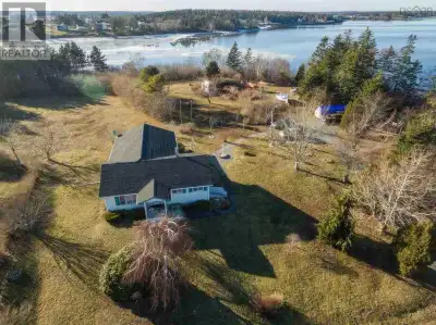 Nestled along the picturesque shores of Surettes Island, 1322 Highway 308 offers an idyllic waterfro...