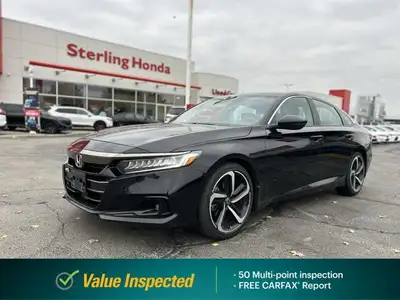 Sporting the performance-oriented 2021 Honda Accord Sedan Sport 2.0 in captivating Crystal Black Pea...