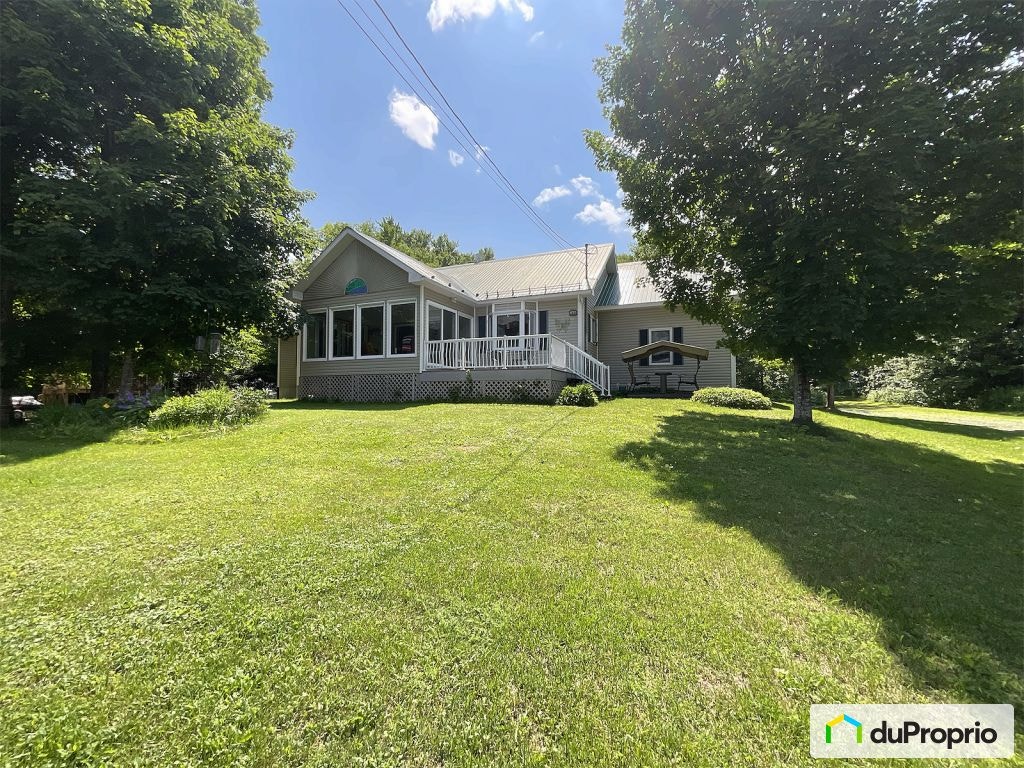 $599,000 - Bungalow for sale in St-Hermenegilde — photo 1