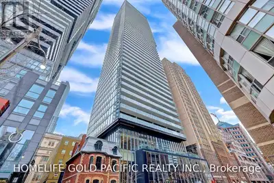 FULLY FURNISHED Luxurious Karma Condo Located At Bay & College. Very Bright And Spacious South View...
