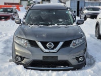The 2016 Nissan Rogue SV in a sophisticated gray finish, combined with its FWD drivetrain, offers a... (image 5)