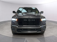 The 2026 Ram 1500 Sport, presented in a sophisticated gray finish, offers powerful 44 capabilities c... (image 7)