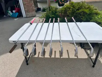 Ping G2 irons and putter with new Golf Pride Grips, View more
