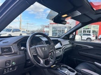 Conquer every adventure with the rugged yet refined 2023 Honda Passport TrailSport, a vehicle engine... (image 8)