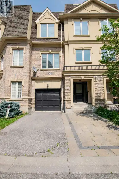Welcome to 1250 St. Martins Drive, a modern 2 Bedroom + Den townhouse located in the highly sought-a...