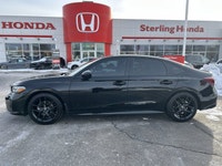 Elevate your daily journey in the stunning Crystal Black Pearl 2026 Honda Civic Sedan Sport. With ju... (image 7)