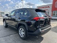 Command the road in this sleek 2023 Toyota RAV4 LE, boasting a Midnight Black Metallic exterior that... (image 6)