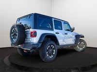 This Jeep Wrangler has a strong ERC 3.6L Pentastar(TM) VVT V6 engine w/ESS engine powering this Auto... (image 5)