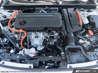 Introducing the 2026 Honda Civic Hybrid in a stunning white finish, this new sedan promises sophisti... (image 5)