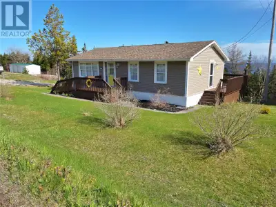 Nestled on a stunning 1.4-acre oceanfront lot, this well-maintained 2-bedroom, 2-bathroom bungalow o...