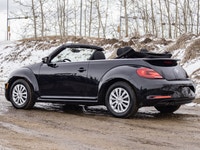 This Volkswagen blends iconic design with open-air driving fun. This vehicle has no reported acciden... (image 8)