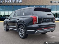 Embark on every journey with confidence and comfort in this stunning Abyss Black 2024 Hyundai Palisa... (image 2)